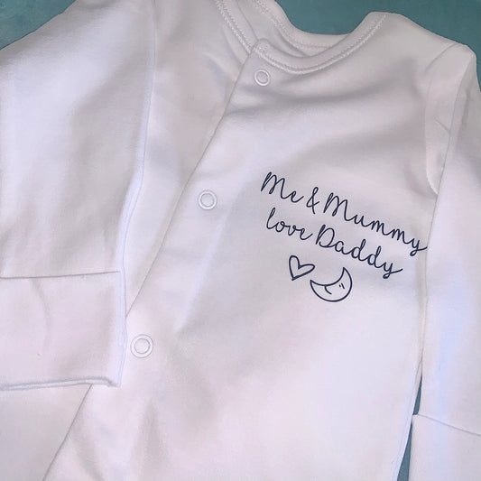 Sleepsuit with message, love heart and moon.